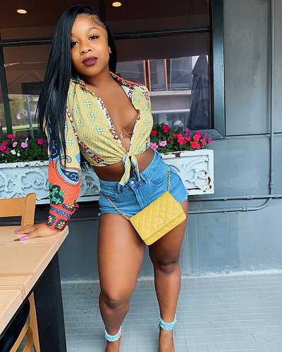 ‘Always Slaying’: Reginae Carter Steps Out in Neon and Fans Go Crazy